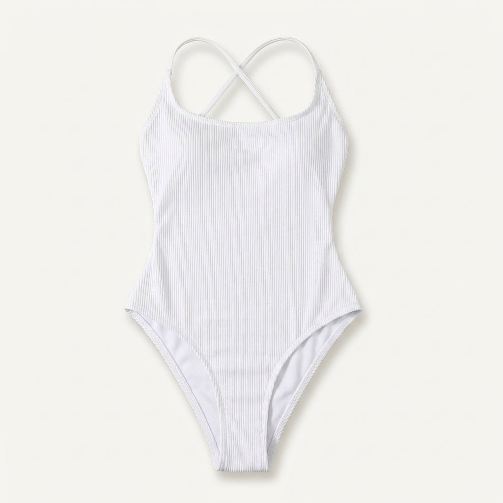 A white ribbed one-piece swimsuit with thin crossed shoulder straps, shown flat against a light off-white background.